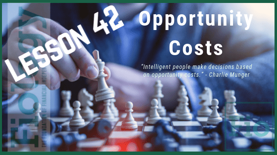 This is the header image for the Fiology lesson on Opportunity Cost - Everything In Life Is a Trade-Off. It depicts the title of the lesson and an image of a person moving chess pieces on a chess board.