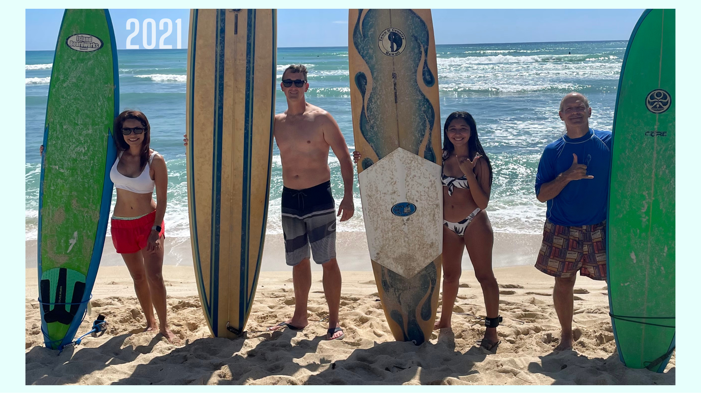 Family surfing in Hawaii in 2021