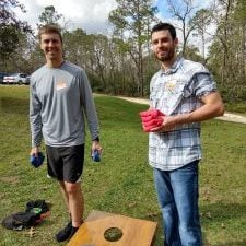 Chad Carson and Ryan Playing Cornhole